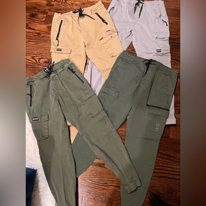 2 pairs for $30 both size large, good condition , greens were both sold